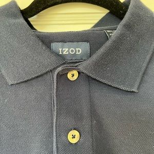 Polo shirt in navy. Izod 100% cotton. Never worn, but no tags